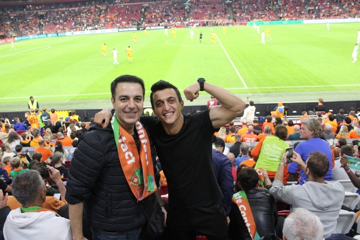 Reza and Mobin at the football match